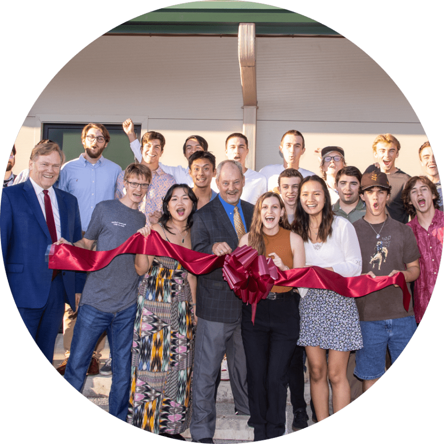 Engineering department cutting ribbon for new building